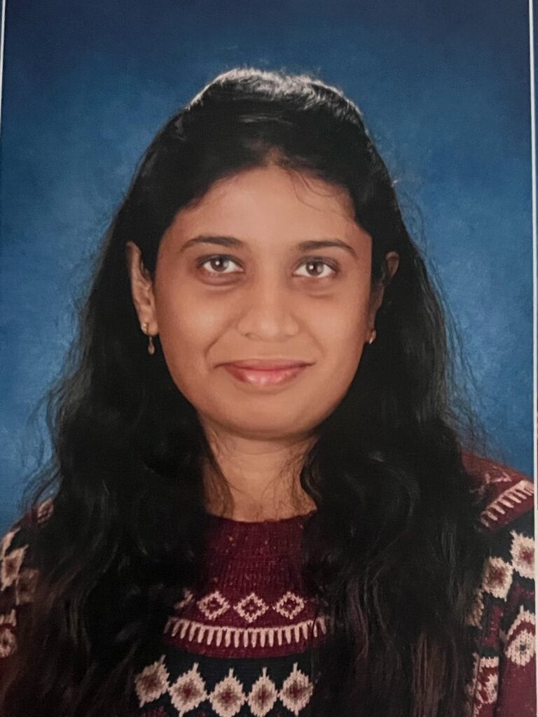 Miss Anjana, AMS credentialed lead teacher at Cherry Lane Montessori